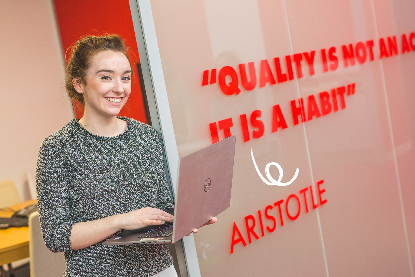 QueryClick Walking with Laptop in Front of Meeting room