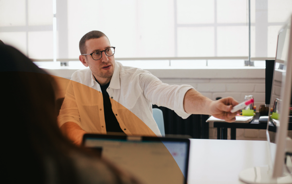 QueryClick Team Member Pointing with Pen